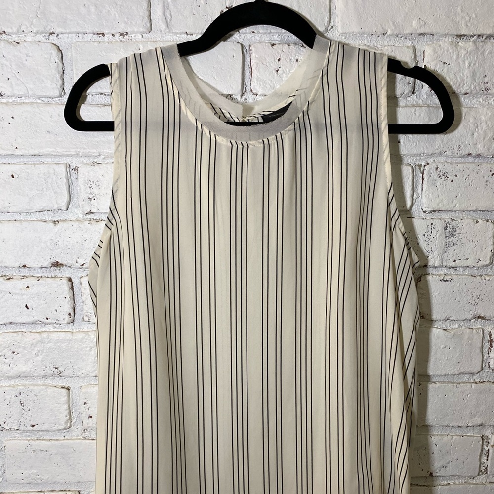 Cool striped tank top with mesh accent.